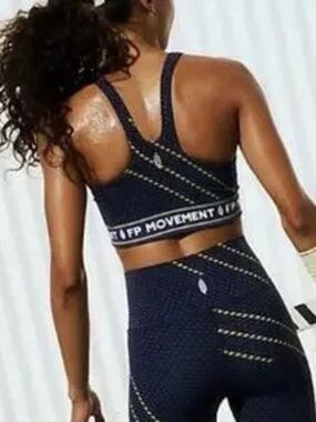 NEVER BETTER GRAPHIC LOGO SPORTS BRA